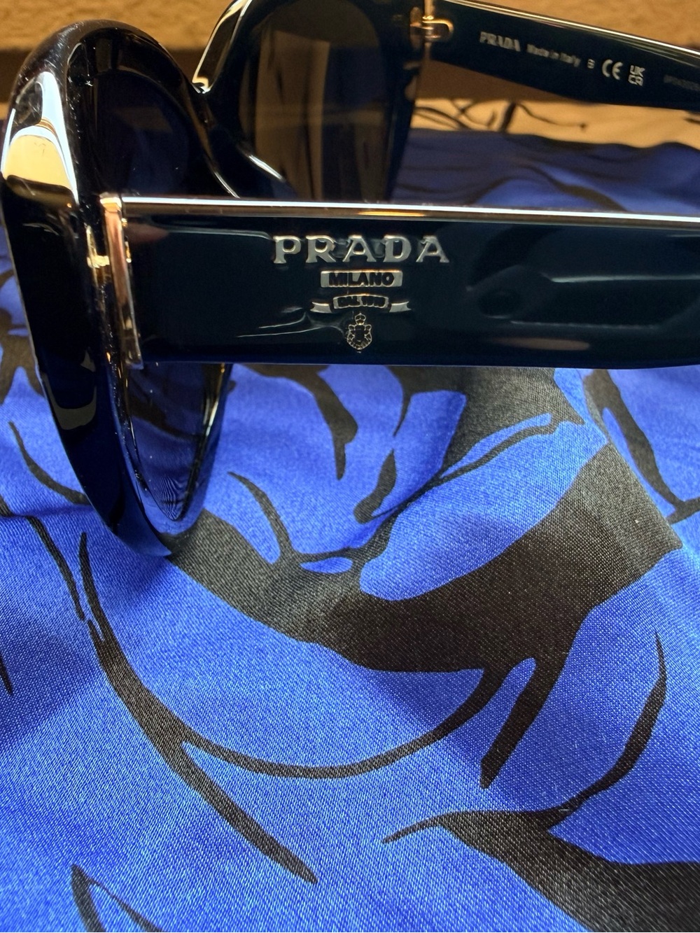 Prada Black Womens Sunglasses with Silver & Gold Logo